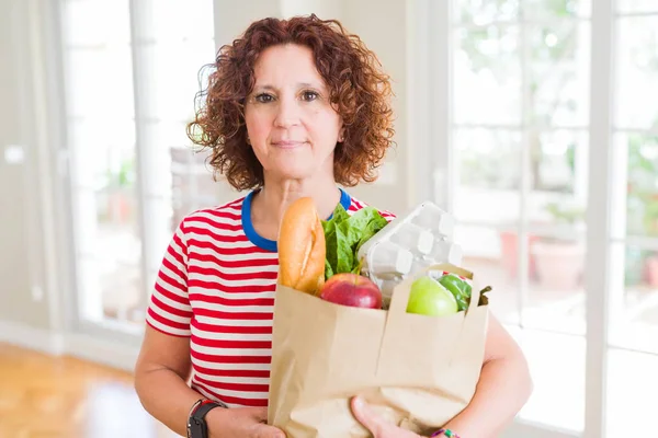 Senior Woman Holding Paper Bag Full Fresh Groceries Supermarket Confident — Stock Photo, Image
