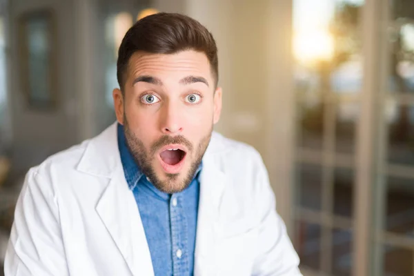 Young Handsome Doctor Man Clinic Afraid Shocked Surprise Expression Fear — Stock Photo, Image