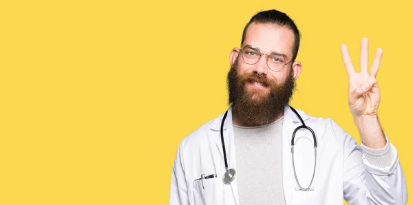 Young Blond Doctor Man Beard Wearing Medical Coat Showing Pointing — Stock Photo, Image