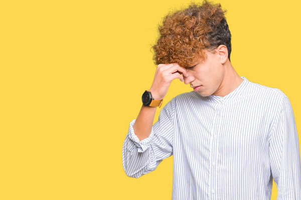 Young handsome business man with afro hair wearing elegant shirt tired rubbing nose and eyes feeling fatigue and headache. Stress and frustration concept.