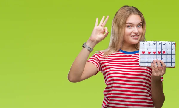 Joven Mujer Caucásica Sosteniendo Calendario Menstruación Sobre Fondo Aislado Haciendo — Foto de Stock