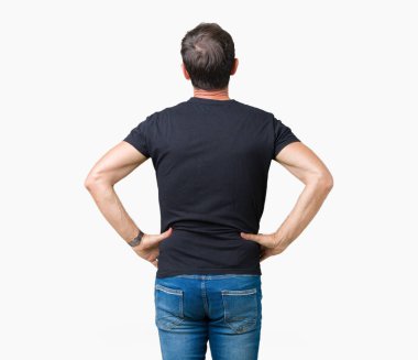 Yakışıklı orta yaş ağarmış komuta sizde izole arka plan ayakta geriye doğru uzakta silah ile vücut üzerinde seyir üzerinde