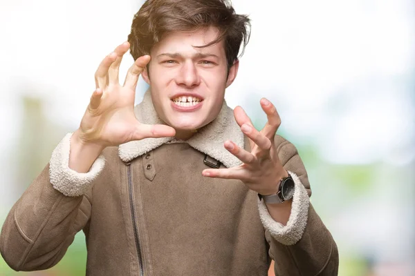 Joven Hombre Guapo Con Abrigo Invierno Sobre Fondo Aislado Gritando —  Fotos de Stock