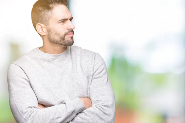 Jovem Homem Bonito Vestindo Camisola Sobre Fundo Isolado Sorrindo Olhando — Fotografia de Stock