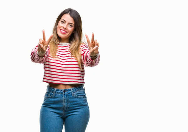 Junge Schöne Frau Lässig Gestreifter Winterpullover Über Isoliertem Hintergrund Lächelnd — Stockfoto