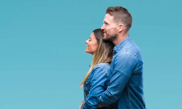Young Couple Love Isolated Background Looking Side Relax Profile Pose — Stock Photo, Image