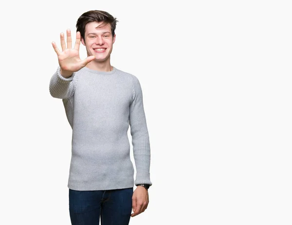이상의 스웨터를 잘생긴 젊은이 보여주는 손가락으로 가리키는 자신감과 — 스톡 사진