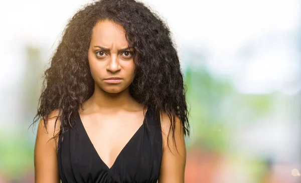 Young Beautiful Girl Curly Hair Wearing Fashion Skirt Skeptic Nervous — Stock Photo, Image