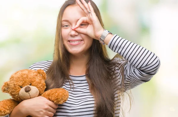 Joven Mujer Caucásica Sosteniendo Oso Peluche Sobre Fondo Aislado Con —  Fotos de Stock