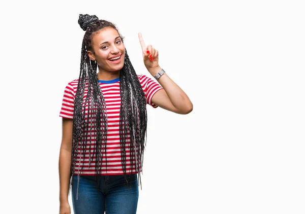 Joven Trenzado Pelo Afroamericano Chica Sobre Fondo Aislado Mostrando Apuntando —  Fotos de Stock