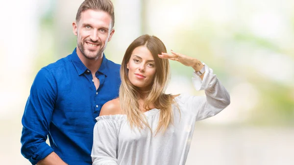 Pareja Joven Enamorada Sobre Fondo Aislado Gesticulando Con Las Manos — Foto de Stock