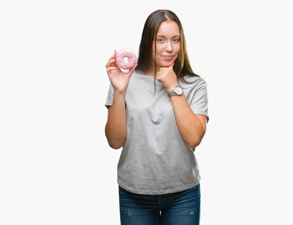 Mujer Caucásica Joven Comiendo Donut Dulce Sobre Fondo Aislado Cara —  Fotos de Stock