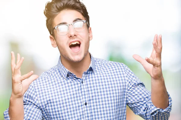 Joven Hombre Guapo Con Gafas Sobre Fondo Aislado Loco Loco —  Fotos de Stock