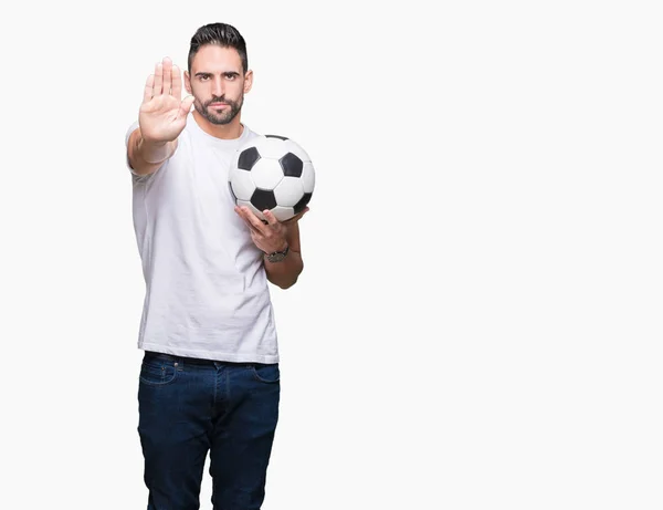 Jovem Segurando Bola Futebol Sobre Fundo Isolado Com Mão Aberta — Fotografia de Stock