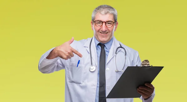 Handsome Senior Doctor Man Holding Clipboard Isolated Background Surprise Face — Stock Photo, Image