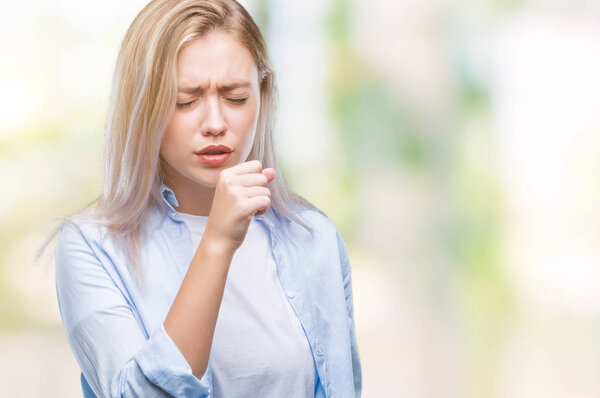 Young blonde woman over isolated background feeling unwell and coughing as symptom for cold or bronchitis. Healthcare concept.