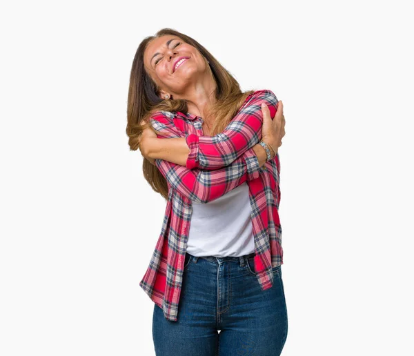 Vackra Medelålders Kvinna Som Bär Över Isolerade Bakgrund Hugging Själv — Stockfoto