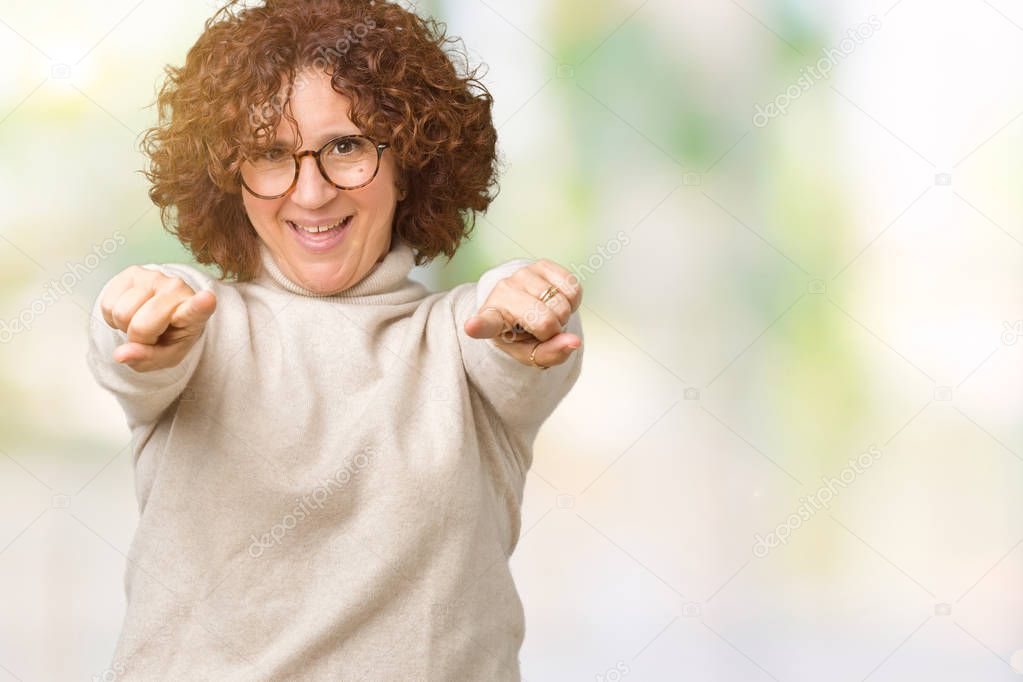 Beautiful middle ager senior woman wearing turtleneck sweater and glasses over isolated background Pointing to you and the camera with fingers, smiling positive and cheerful