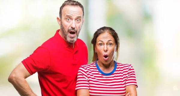 Middle Age Hispanic Couple Love Isolated Background Afraid Shocked Surprise — Stock Photo, Image