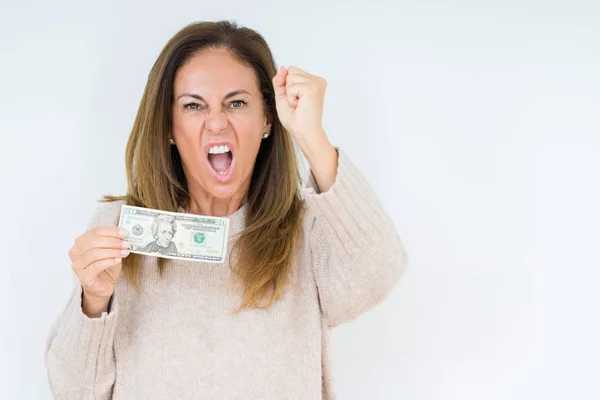 Mujer Mediana Edad Sosteniendo Billete Dólares Sobre Fondo Aislado Molesto — Foto de Stock