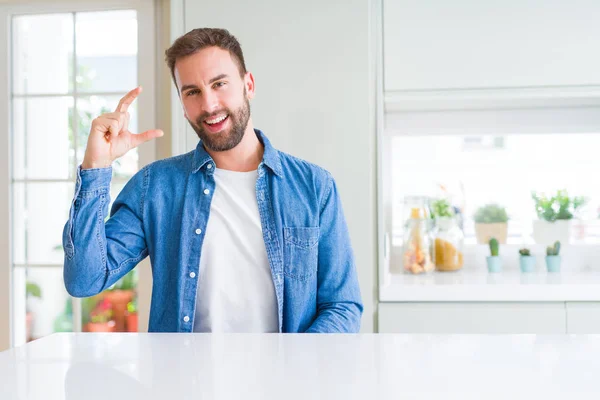 Handsome Man Home Smiling Confident Gesturing Hand Doing Size Sign — Stock Photo, Image