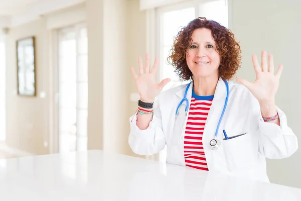 Senior Doctor Woman Wearing Medical Robe Clinic Showing Pointing Fingers — Stock Photo, Image