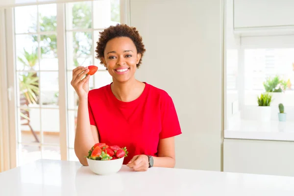 Young African American Woman Eating Fresh Strawberries Breakfast Happy Face — Stock Photo, Image