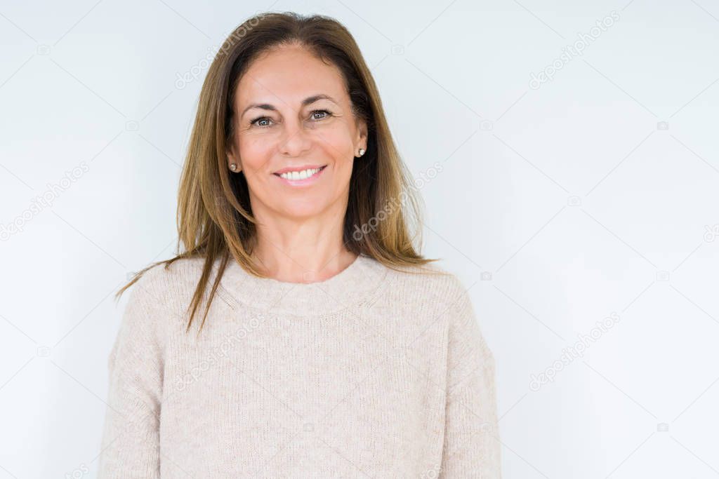 Beautiful middle age woman over isolated background with a happy and cool smile on face. Lucky person.