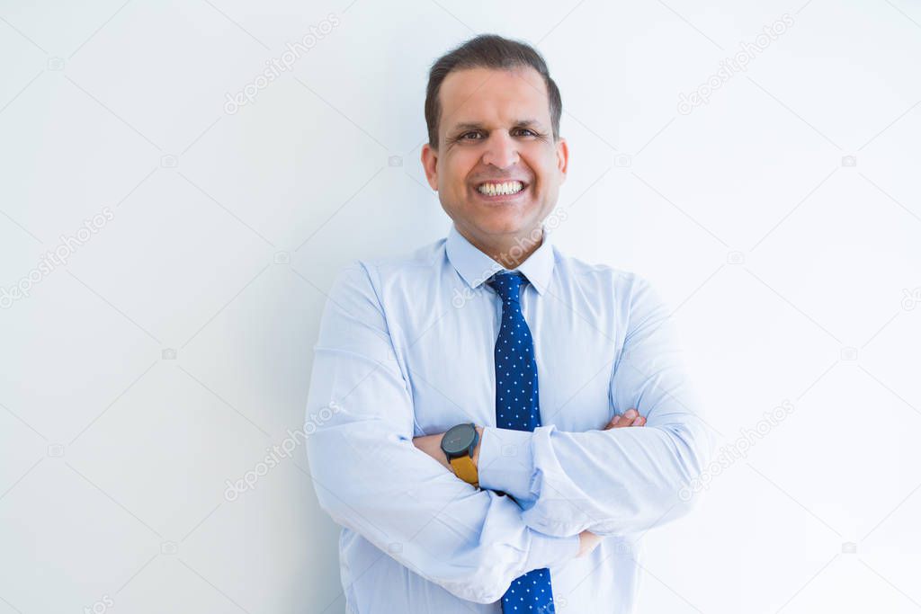 Middle age business man smiling to the camera