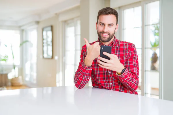 Handsome Man Using Smartphone Happy Big Smile Doing Sign Thumb — Stock Photo, Image