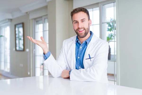 Handsome Doctor Man Wearing Medical Coat Clinic Smiling Cheerful Presenting — Stock Photo, Image