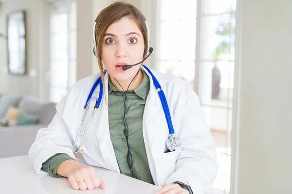 Beautiful Young Doctor Woman Wearing Headset Afraid Shocked Surprise Expression — Stock Photo, Image