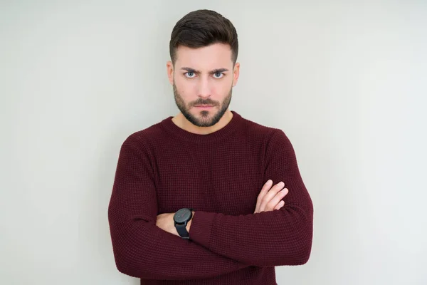 Joven Hombre Guapo Usando Suéter Sobre Fondo Aislado Escéptico Nervioso —  Fotos de Stock