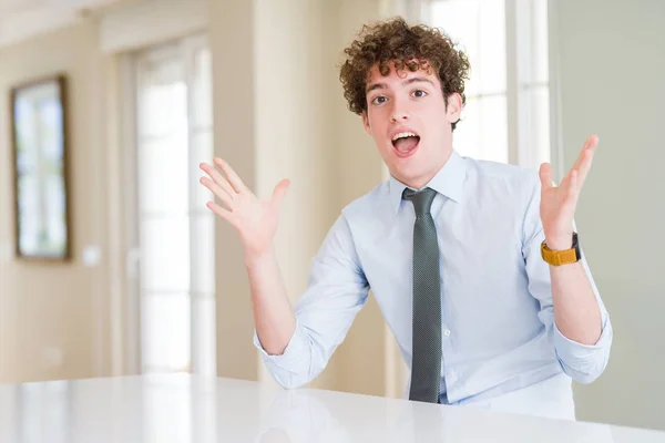 Young Business Man Wearing Tie Celebrating Crazy Amazed Success Arms — Stock Photo, Image