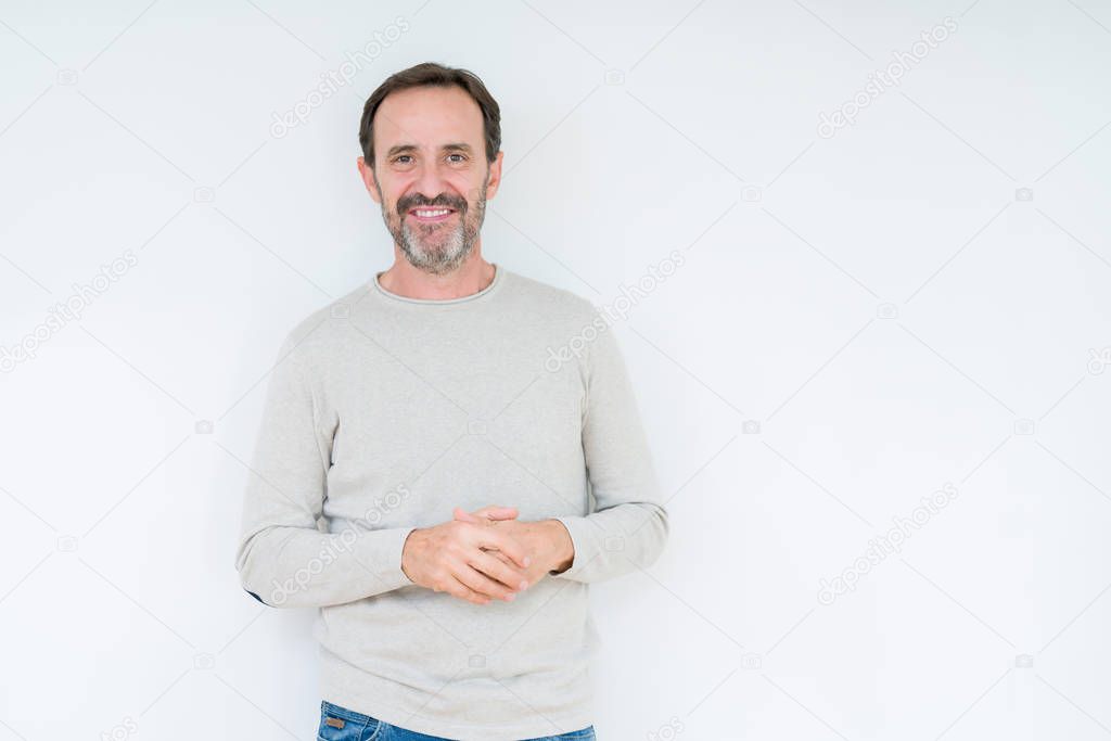 Elegant senior man over isolated background Hands together and fingers crossed smiling relaxed and cheerful. Success and optimistic