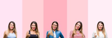 Genç güzel kadın hareketi el ile mutlu Yaşasın yapıyor pembe çizgili izole arka plan yüzünden kolaj. Kameraya bakarak başarı gösteren ile ifade onaylama.