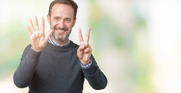 Bonito Homem Meia Idade Sênior Vestindo Uma Camisola Sobre Fundo — Fotografia de Stock