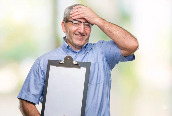 Handsome Senior Inspector Man Holding Clipboard Isolated Background Stressed Hand — Stock Photo, Image