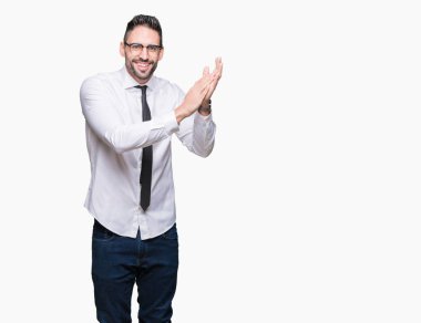 Genç yakışıklı iş adam gözlük izole üzerinde arka plan Clapping ve mutlu ve neşeli, gururlu gülümseyen birlikte eller alkış