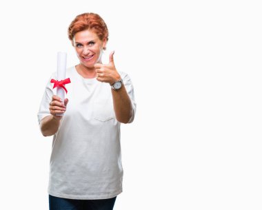 Ok işareti, başparmak ile parmak, mükemmel işareti yapıyor kocaman bir gülümseme ile arka plan mutlu derecesi sertifika tutan üst düzey beyaz kadın izole