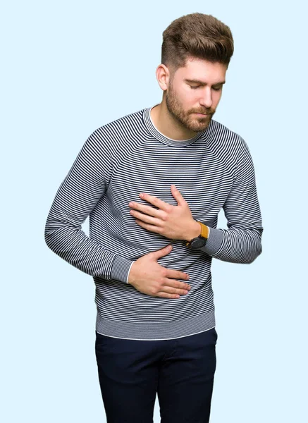 Young Handsome Man Wearing Stripes Sweater Hand Stomach Because Nausea — Stock Photo, Image