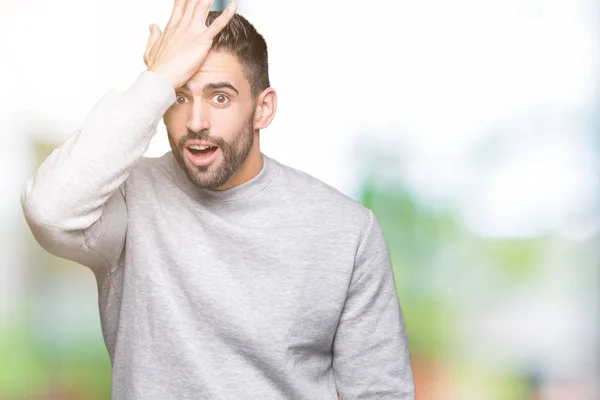 Joven Hombre Guapo Con Sudadera Sobre Fondo Aislado Sorprendido Con — Foto de Stock