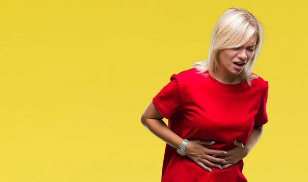 Young beautiful blonde woman wearing red t-shirt over isolated background with hand on stomach because indigestion, painful illness feeling unwell. Ache concept.