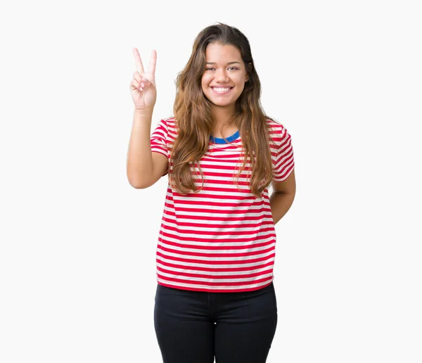 Joven Mujer Morena Hermosa Con Rayas Camiseta Sobre Fondo Aislado — Foto de Stock