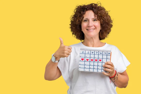 Middle Ager Senior Woman Holding Menstruation Calendar Isolated Background Happy — Stock Photo, Image