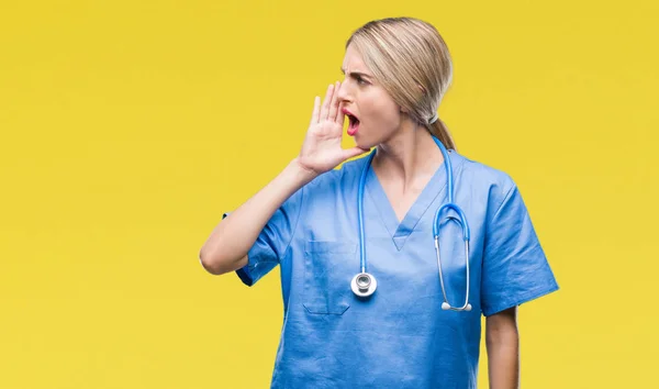 Young Beautiful Blonde Doctor Surgeon Nurse Woman Isolated Background Shouting — Stock Photo, Image