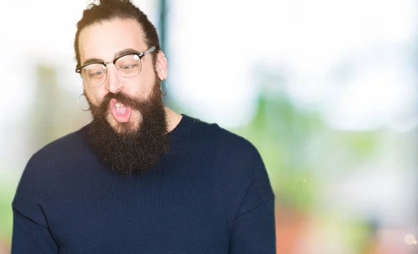 Young Hipster Man Long Hair Beard Wearing Glasses Making Fish — Stock Photo, Image