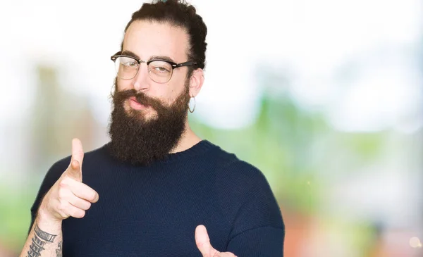 Young Hipster Man Long Hair Beard Wearing Glasses Pointing Fingers — Stock Photo, Image