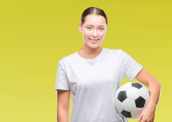 Junge Schöne Kaukasische Frau Hält Fußballball Über Isoliertem Hintergrund Mit — Stockfoto