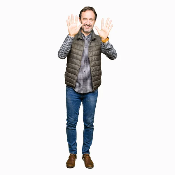Middle Age Handsome Man Wearing Winter Vest Showing Pointing Fingers — Stock Photo, Image